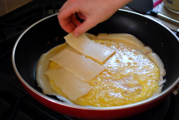 Layering Cheese on crepes
