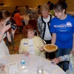 Nicole taking photos of pie